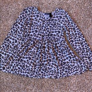 A long sleeve flowy shirt from The Buckle.